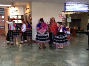 Some folkloric performers before they started dancing by baggage claim