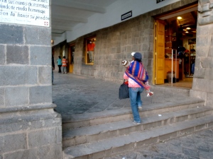 The traditional Incan way of carrying your children around.. Looks less comfortable than my backpack!